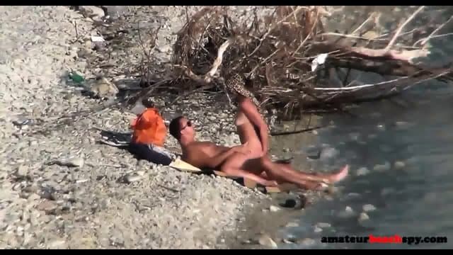 Nudists caught having sex on voyeur beach