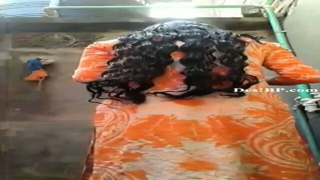 Indian girl bathing