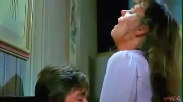 Older woman young boy ( A night in heaven scene )