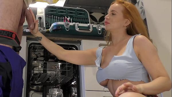 Sexy and horny redhead housewife teases a big cock plumber and gives him a handjob while recording him