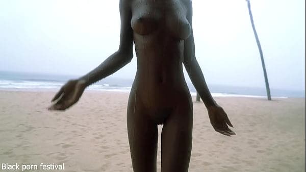 Skinny ebony village girl dancing naked in the rain with her perfect slim body