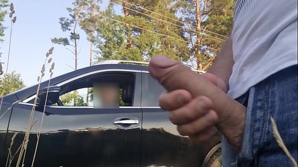 I pull out my cock on a beach area. This young woman who drives from this beach, looks shocked by what she sees !! She want look how i cum